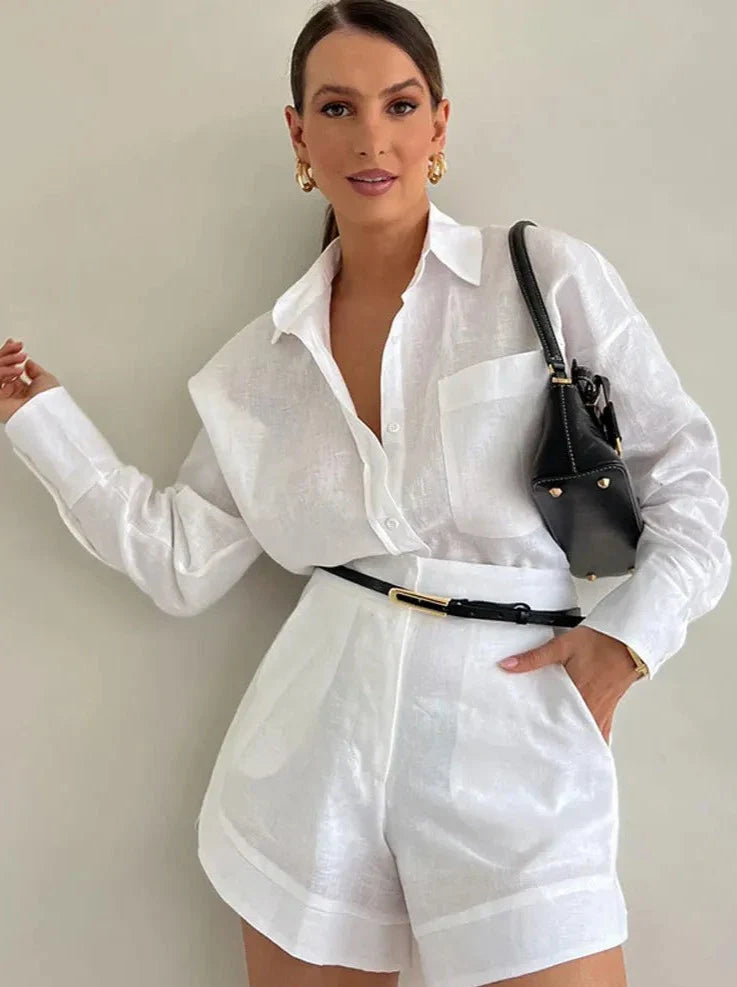 Top elegante a maniche lunghe con tasche e pantaloncini 