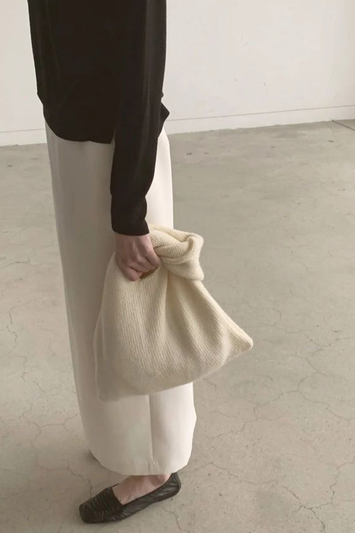 Elegante borsa tote in maglia color crema minimalista