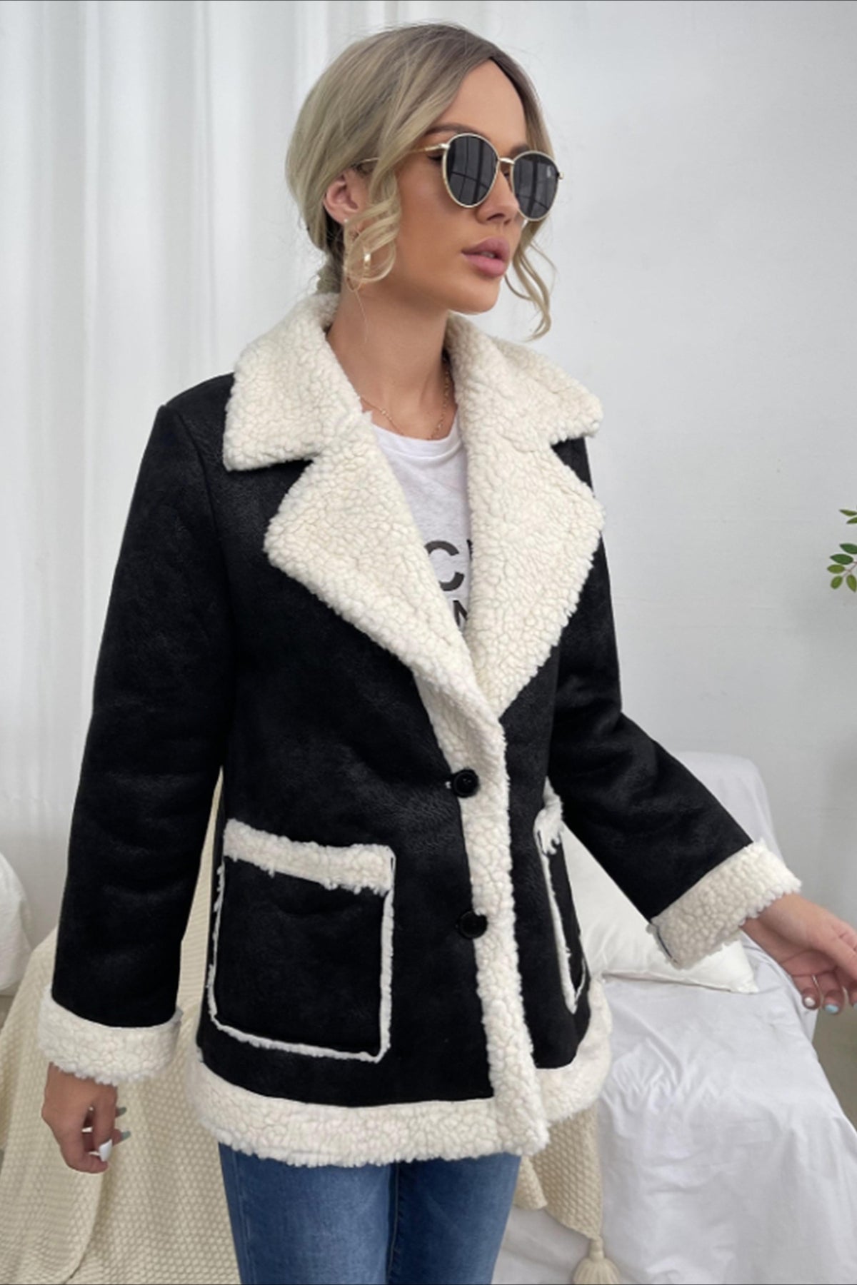 Blazer alla moda in finta pelliccia di montone bianco e nero